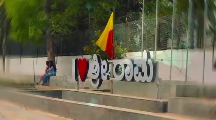 Students in uniform by the campus signage, walking the corridors and studying together outdoors